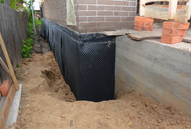 Happy homeowners after waterproofing job in Fort Lee